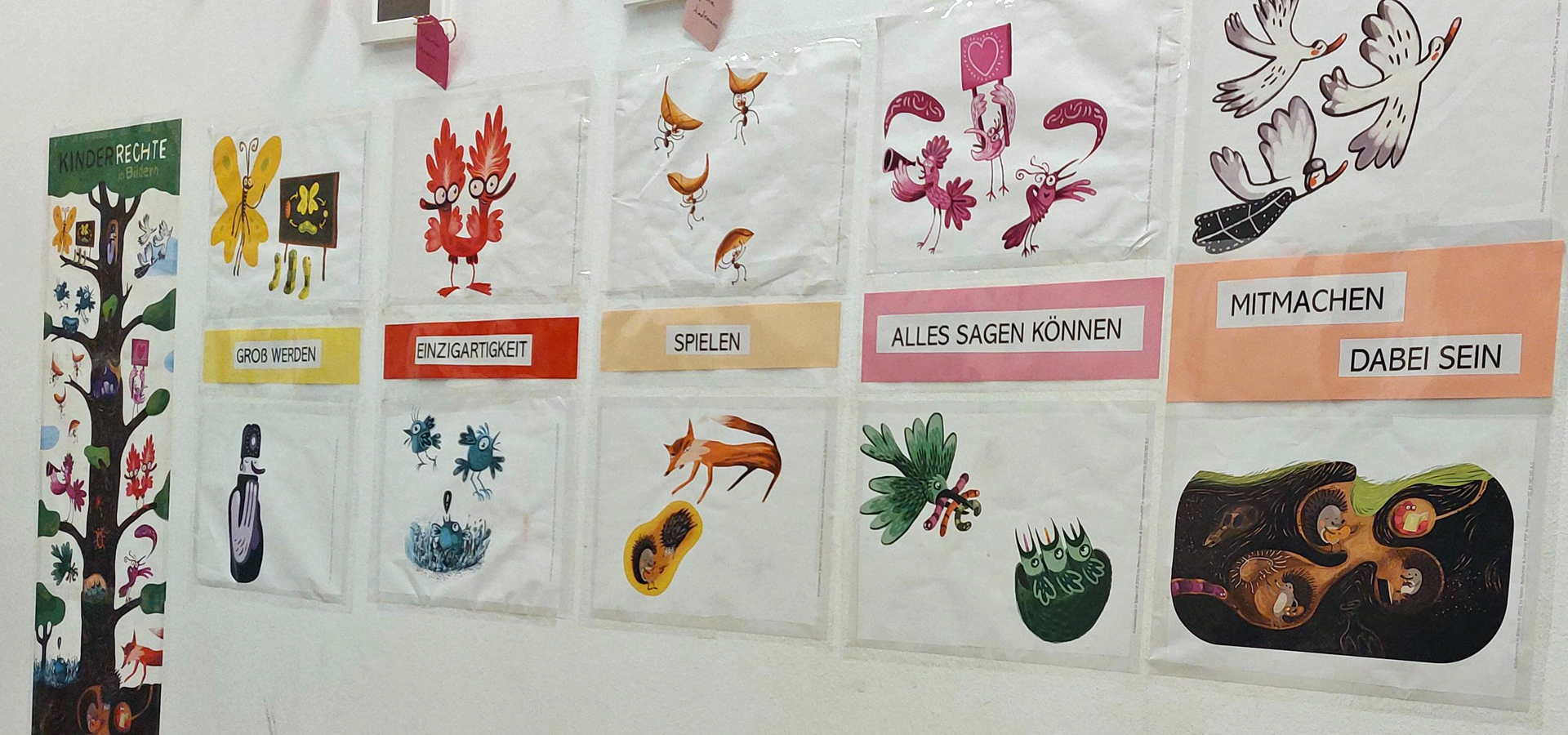 Ein Wandbild zeigt Kinderrechte mit passenden Bildern dazu